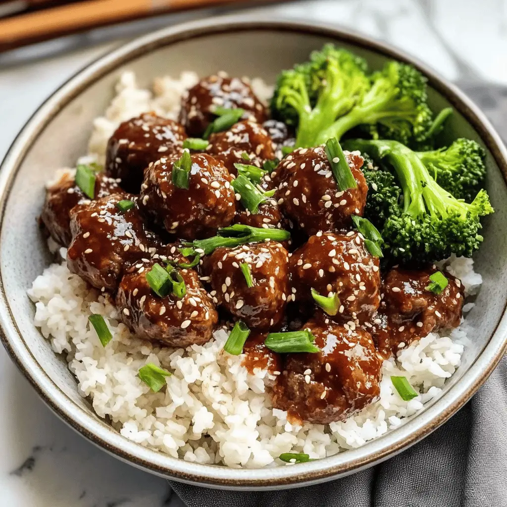 Get ready for a quick and delicious dinner! These 30-minute Mongolian Beef Meatballs are packed with bold flavors and made with tender beef, garlic, and ginger. Perfect for busy weeknights, serve them over rice or noodles for an easy meal. Save this recipe now for a savory dish that will impress your family and friends!